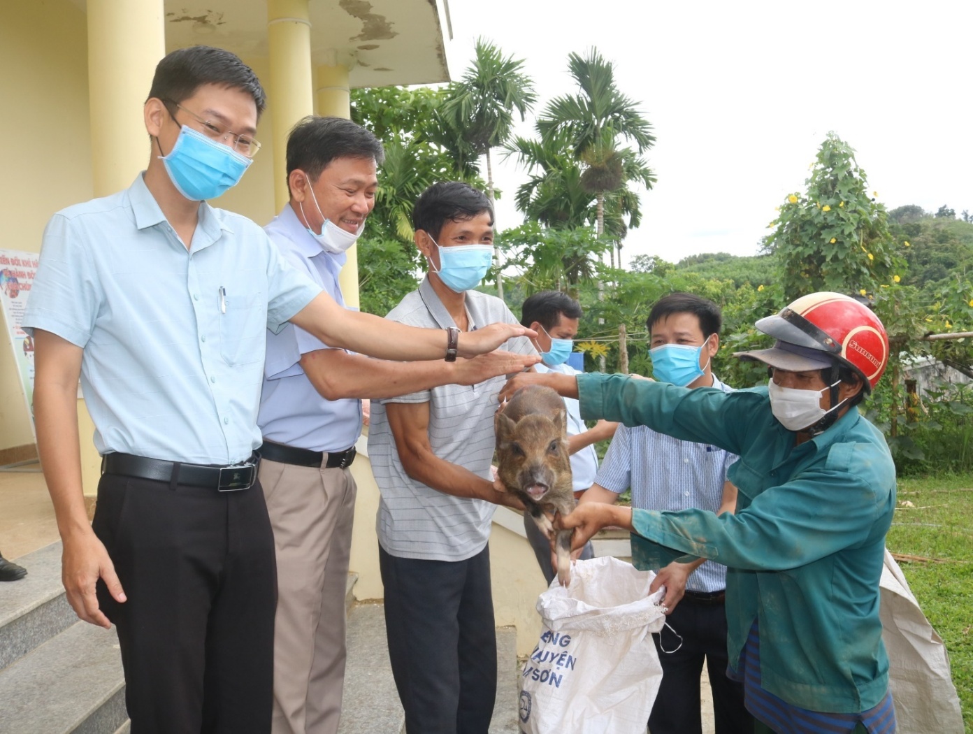 Description: A group of people with a dog

Description automatically generated with medium confidence